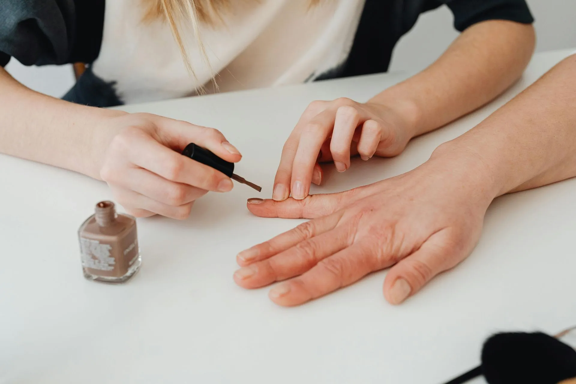 Professional manicure service at Alura Beaute