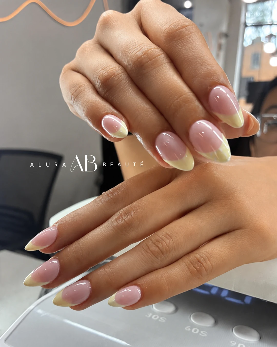 Alura Beaute manicure with a soft pink French design